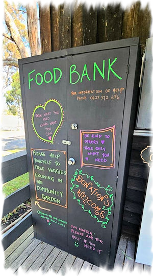 Open community pantry with shelf of staple items